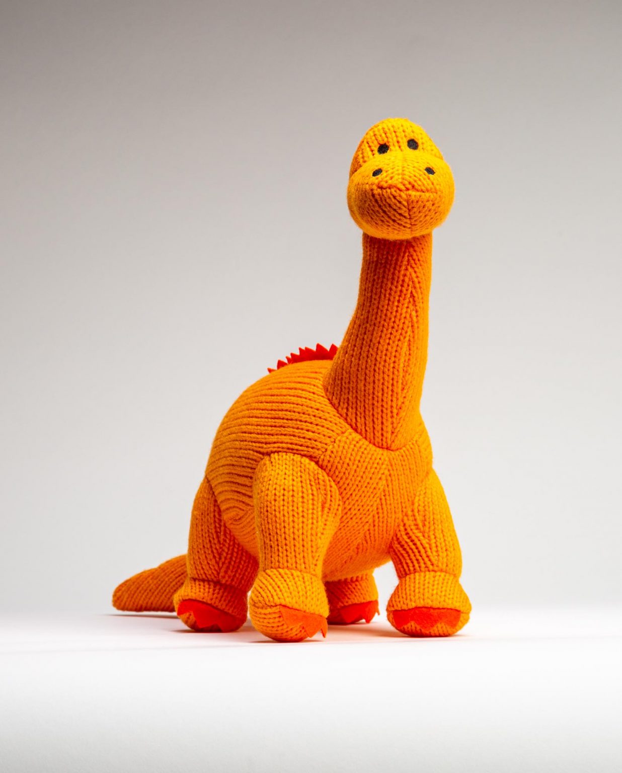 Orange Knitted Diplodocus Soft Toy - Send a Cuddly