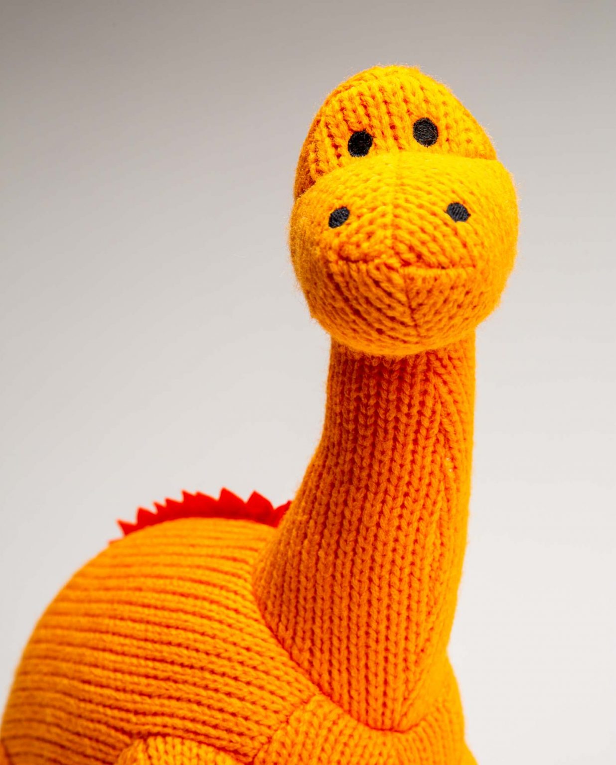 Orange Knitted Diplodocus Soft Toy - Send a Cuddly