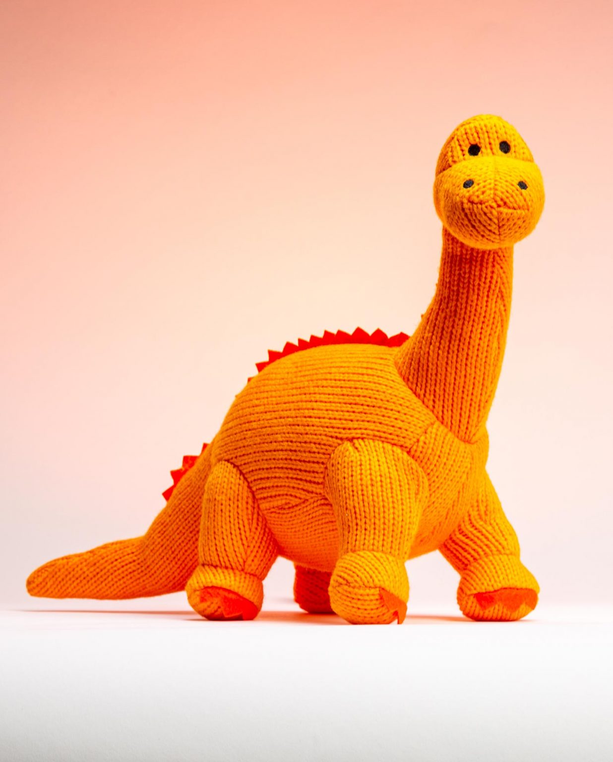 Orange Knitted Diplodocus Soft Toy - Send a Cuddly