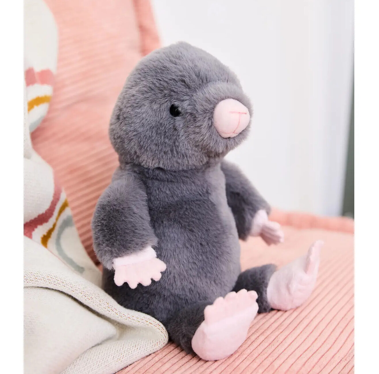 Soft toy mole on seat