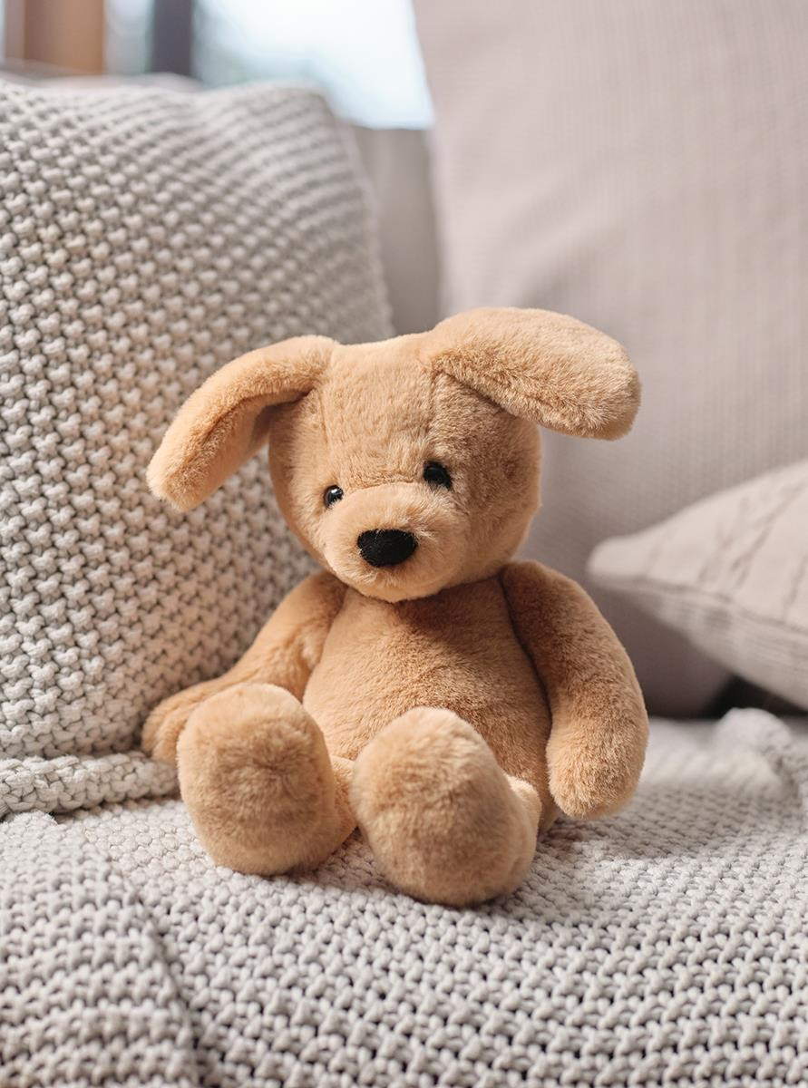 Ruff Puppy soft toy on sofa